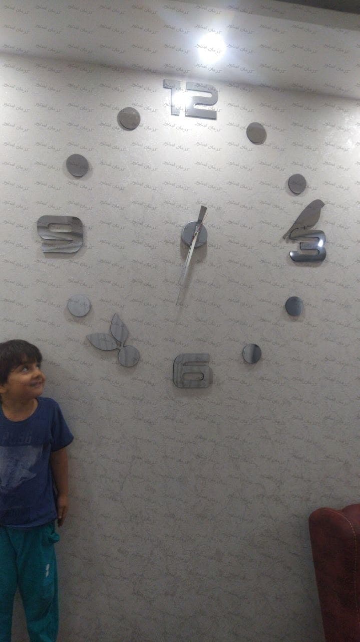 نمونه نصب شده ساعت دیواری فانتزی طرح پرنده